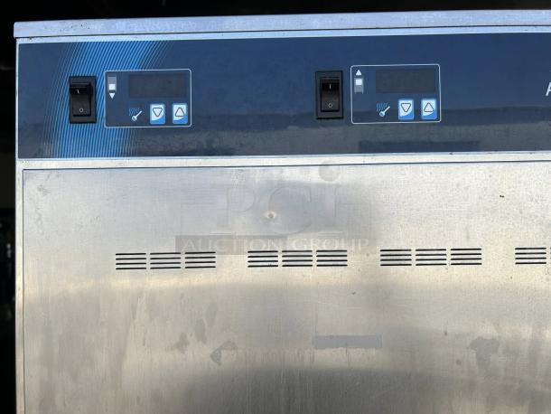 Alto-Shaam 1200-UP heated cabinet in excellent condition, fully tested. Features digital controls and stainless steel exterior.
