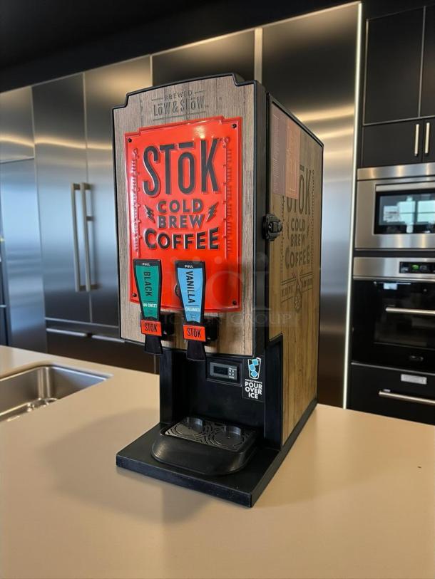 CreaMiser 230 STōK Cold Brew Dispenser, 110V, dual taps, tested and working, StōK branding on wood finish, great condition.