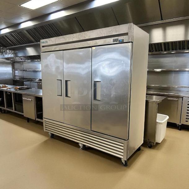 True T-72-HC T-Series 3-section solid door reach-in refrigerator in stainless steel, excellent condition, fully tested.