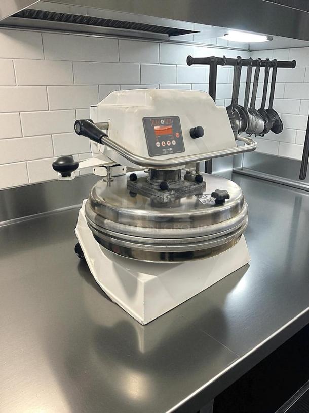 Proluxe DP2010M 22" Pizza Dough Press in excellent condition on a countertop, featuring mold inserts, fully tested and working.
