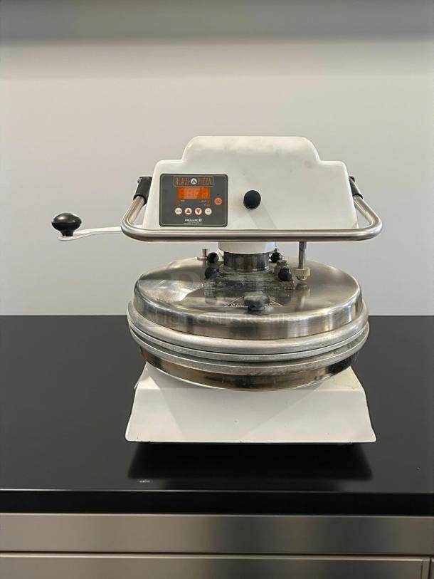 Proluxe DP2010M 22-inch pizza dough press, fully tested, in excellent condition, with mold inserts, countertop model.