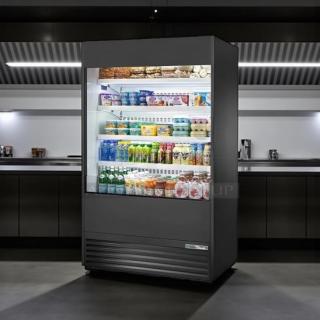 True TAC-48 air curtain merchandiser in great condition, 208/230V, fully tested, displaying assorted products on shelves.