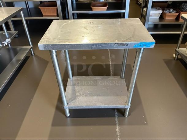GSW stainless steel worktop table in great condition, featuring a sturdy build and lower shelf. Suitable for commercial use.
