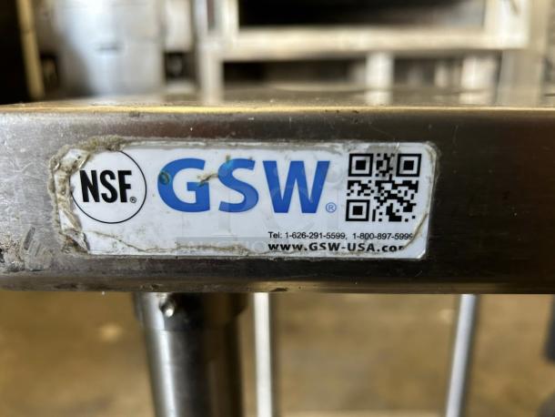 GSW stainless steel worktop table in great condition with NSF certification label and contact info visible.