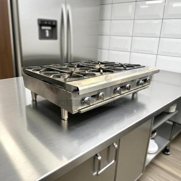 Imperial IHPA-6-36 36" gas hotplate, 6 burners, NSF-certified, fully tested, excellent condition, stainless steel finish.
