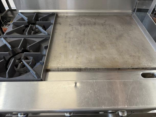 Atosa AGR-2B24GR CookRite gas range with 2 burners and 24" griddle. Stainless steel, great condition, tested working.