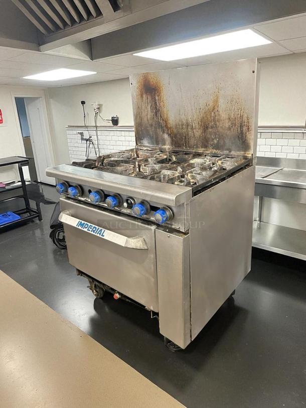 Imperial Range IR-6NG, 36" 6-burner gas range with 26.5” oven, 227,000 BTU, great condition, tested & working, labeled “Imperial.”