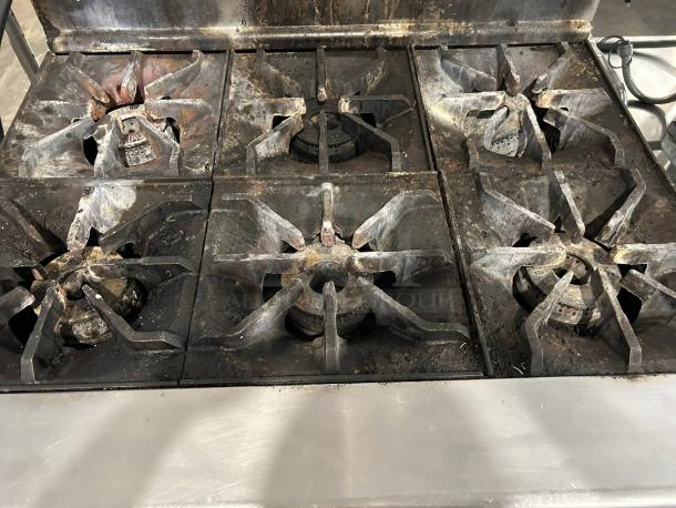 Imperial Range IR-6NG, 36" natural gas, 6 burners, 227,000 BTU, professional series. Surface shows wear, fully tested and working.