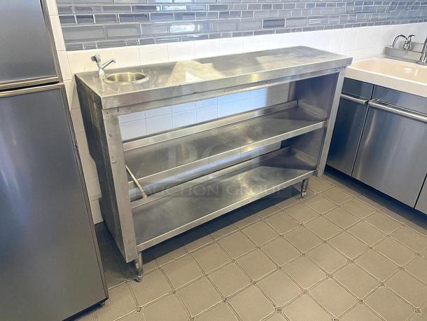 All stainless steel custom-made table with faucet, two shelves, and durable frame. Ideal for kitchen use, sturdy condition.