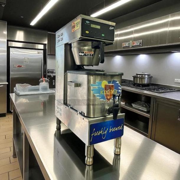 Curtis TBP 9" tea brewer in excellent condition, 3-gallon capacity with dispenser, fully tested, stainless steel, low-profile design.