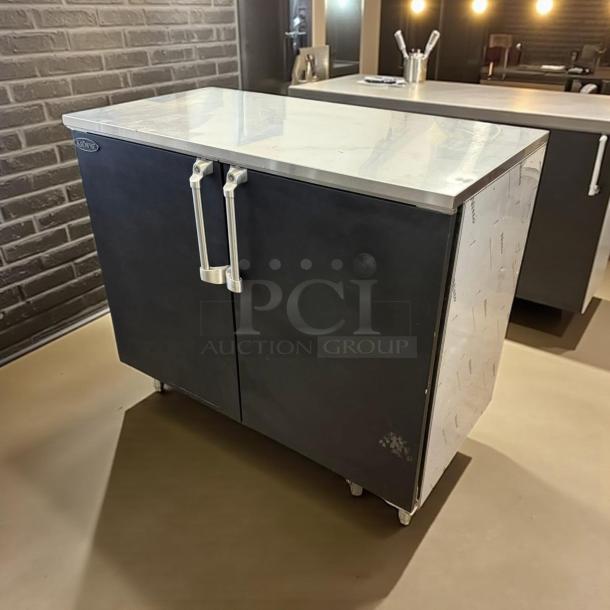 Krowne BR48 48" dry back bar cabinet with 2 solid doors, black, in perfect condition. Tested and working.