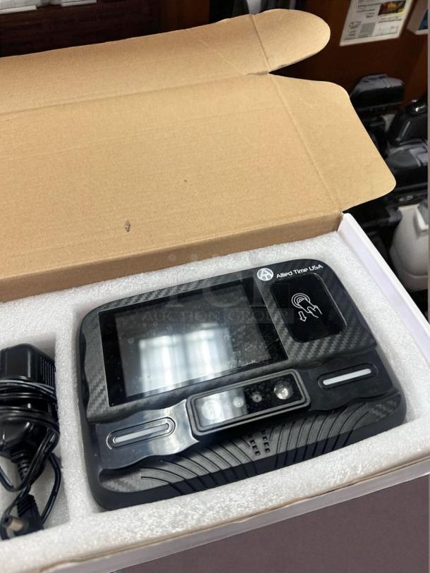 Brand new Allied Time USA facial recognition biometric time clock in original box, unused and fully functional.