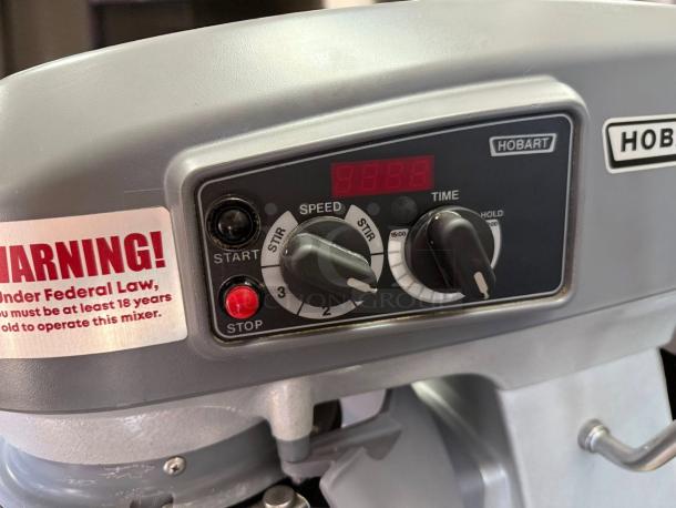 Hobart HL200 20 Qt Commercial Mixer dashboard in outstanding condition, showing controls and warning label. Fully tested and working.