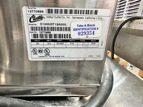 Wilbur Curtis D1000GT12A000 coffee brewer, twin 1.5 gallon, 220V, fully tested, serial #12770695, great condition.