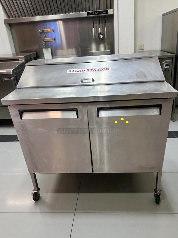 Turbo Air TST-48SD salad prep table, 48", stainless steel, "Salad Station" label, outstanding condition, 115V.