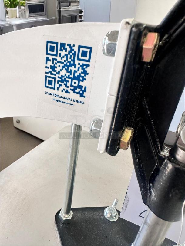 DoughXpress DM-18 manual dough press, 18" plate, heavy-duty steel. Superb condition, QR code for manual and info visible.