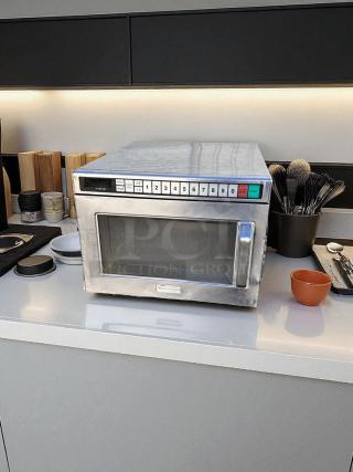 Panasonic commercial microwave in excellent condition, heavy-duty stainless steel, fully tested and working, model details visible.