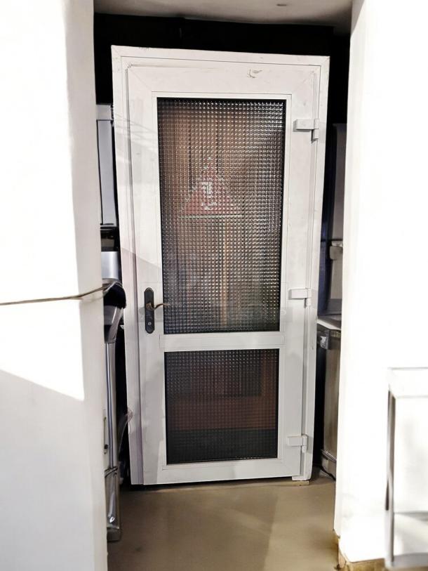 White metal frame door with dual textured glass panels, 36" x 83". Great condition, includes handle and hinges.