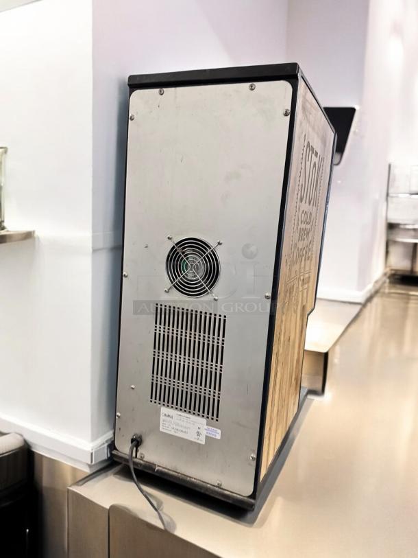 CreaMiser Model 230 Cold Brew Coffee Dispenser, excellent condition, tested and working, 110V, rear view showing fan and label.