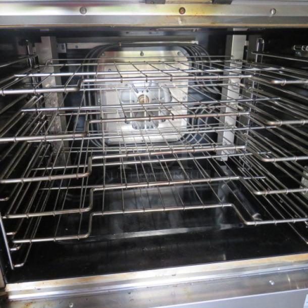 Vulcan VC4ED-11D1 full-size electric convection oven, working condition, with 5 racks, 208V, 3 phase, 41x31x55 inches.
