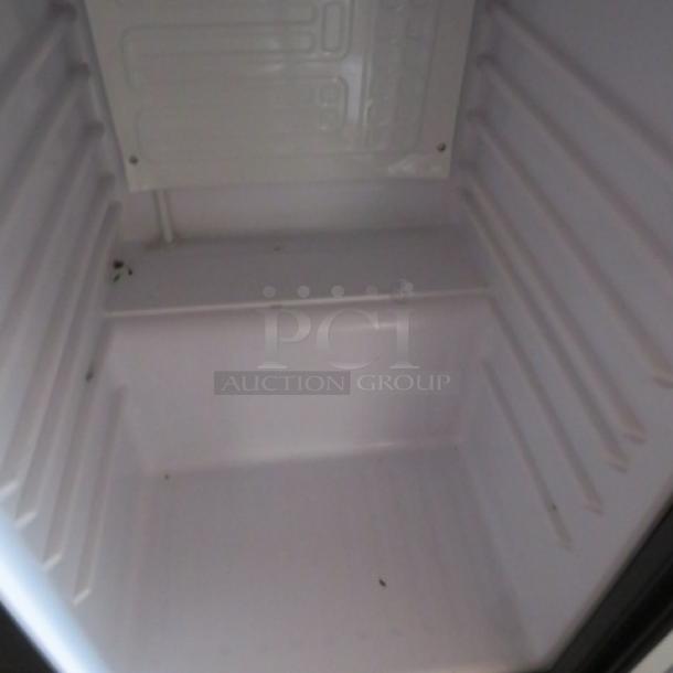 Galaxy Countertop Glass Door Display Cooler, model 177CRG3B. Interior view, used condition. 120 Volt, 17x19x27 inches.