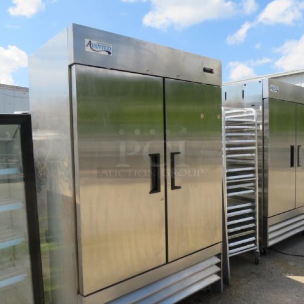 Avantco 2-door stainless steel refrigerator, model 178A49RHC, with 6 racks on casters. Measures 54x32.5x82 inches, 115 volt.