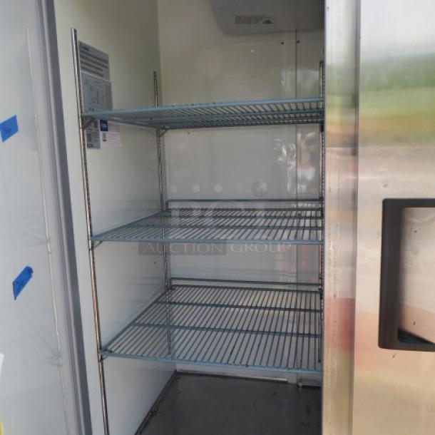Avantco 2 Door Stainless Steel Refrigerator, Model 178A49RHC, with 6 racks and casters. Dimensions: 54x32.5x82 inches.