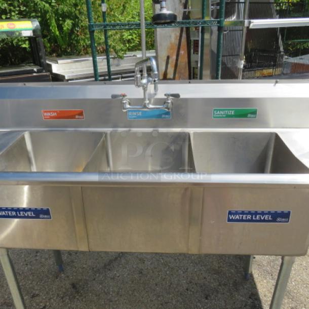 Steelton 3 Compartment Sink with R/L Drain Boards, Faucet, Hose Sprayer, Model 522CB316201B. Size 83x27x44.