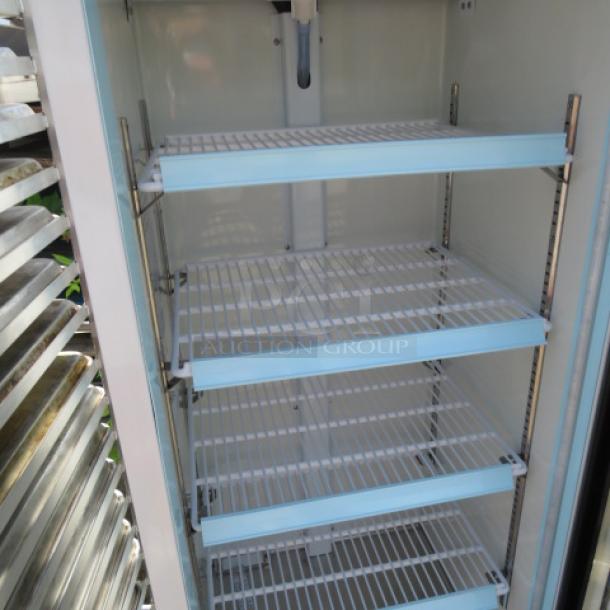 Avantco 1 door glass display cooler, model 178GDC10HCW, with 4 adjustable racks, 21x24x62.5 inches, 115V.