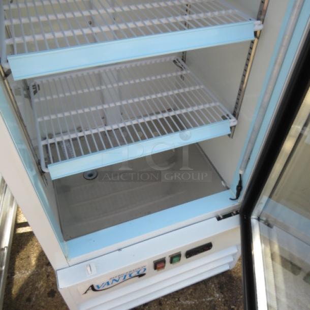 Avantco 1 Door Glass Display Cooler, Model 178GDC10HCW, with 4 racks. Dimensions 21x24x62.5 inches. Working condition.