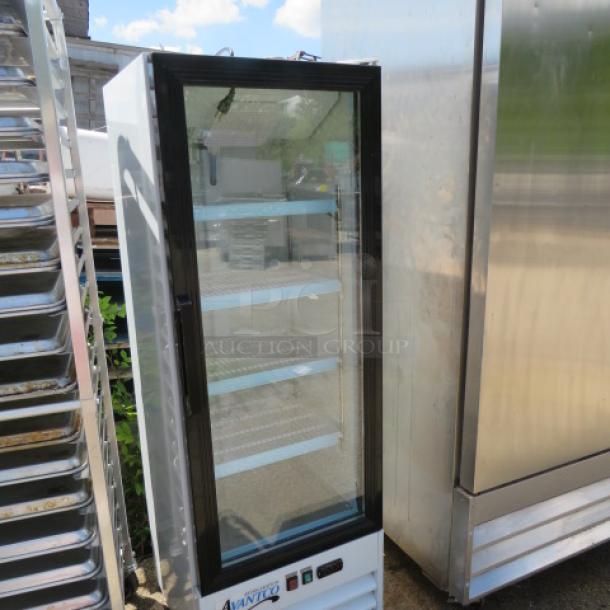 Avantco glass display cooler, model 178GDC10HCW, with 4 racks, 115 Volt. Dimensions: 21x24x62.5 inches. Working condition.