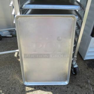 Full-size sheet pan, stainless steel, good condition, minimal wear. Ideal for commercial kitchen use. Marked "4XBID."