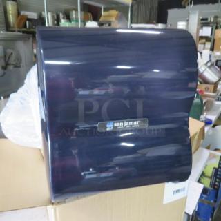 San Jamar T7100TBK 10-inch hands-free automatic paper towel dispenser, new, glossy black finish, model label visible.