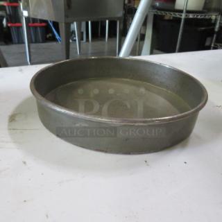 8.5 inch commercial bake pan, metal, round, used condition with slight wear, model 5XBID.