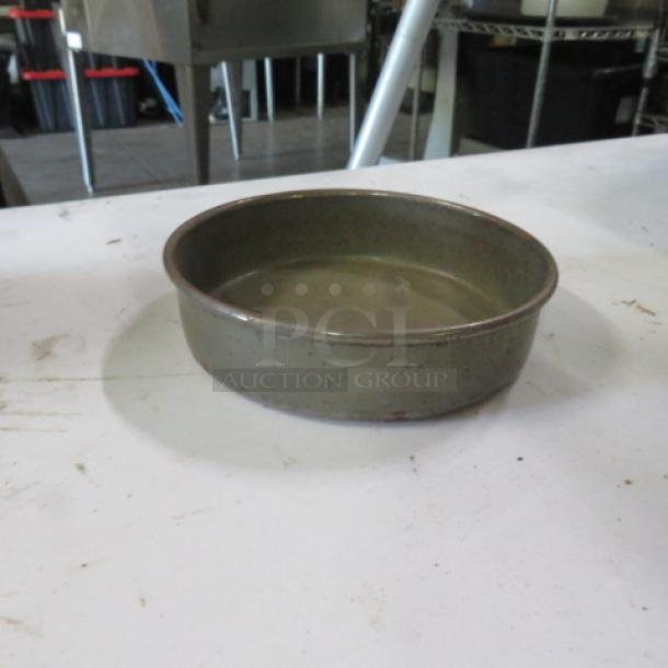 6.5-inch commercial bake pan, metal, gently used condition with minor surface wear, model 4XBID.