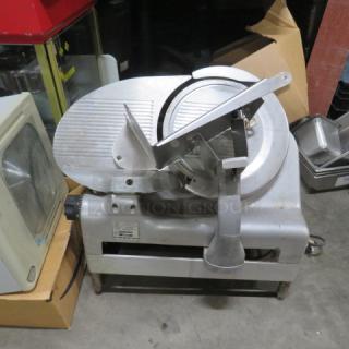 Berkel deli slicer, 115 Volt, working condition, silver finish, used for precision meat slicing, sturdy metal construction.
