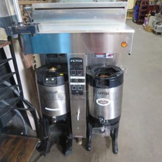 One Fetco Coffee Brewer With 2 Filter Baskets And 2 Satellites On Stand. Unable To Test. 120/208-240 Volt. Model# CBS-2052E. 22X18X38. - Item #1202830