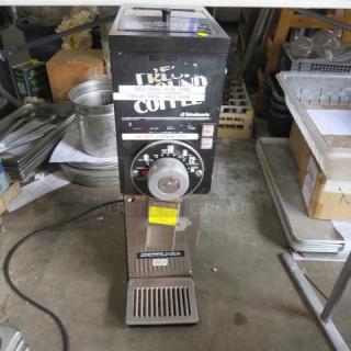 Grindmaster Grinder Model 875, 115V, 7x15x27 inches, features grind settings dial. Visible wear, functional condition.