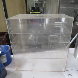 One-door poly bakery case, 5 shelves, top edge broken, dimensions 19x13.5x20 inches.