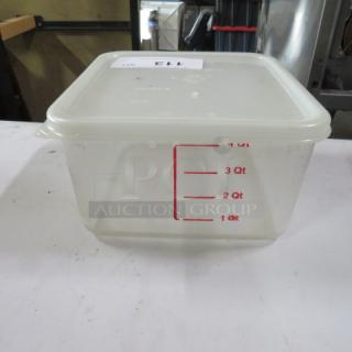 Clear 4-quart food storage container with lid, marked for 1-4 quarts. Used condition, red measurement markings on the side.