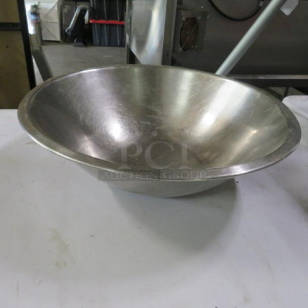 15-inch stainless steel mixing bowl, gently used, with a smooth finish ideal for kitchen tasks.