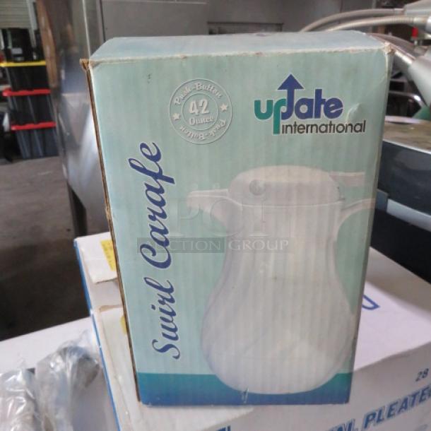 Update International 42oz Swirl Carafe, new in box, white with ergonomic design, sealed packaging.