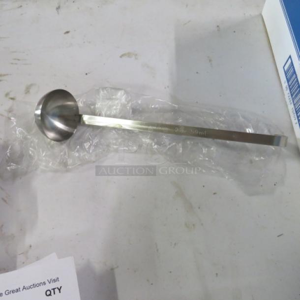 NEW 2oz stainless steel ladle, model 2XBID. Features a long handle, polished finish, and engraved measurements.