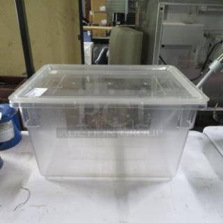 Rubbermaid 21.5-gallon food storage container with lid. Clear, durable plastic. Ideal for bulk storage. Good condition.