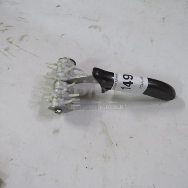 One Roller Docker with white spiked wheel, black handle, and inspection tag marked "149".