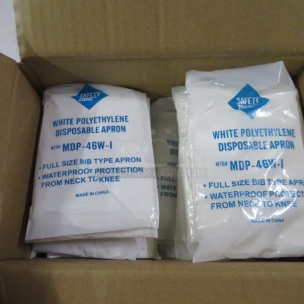 Box of disposable aprons, Safety Zone brand, white polyethylene, model MDP-46W-I, waterproof bib style, new condition.