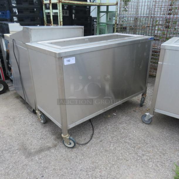 Vollrath Model 36652 stainless steel cold well station on casters, 52x24x36 inches, 120V, mobile design, good condition.