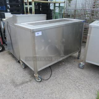 Vollrath Model 36652 stainless steel mobile cold well on casters, 52x24x36 inches, 120V. In working condition.