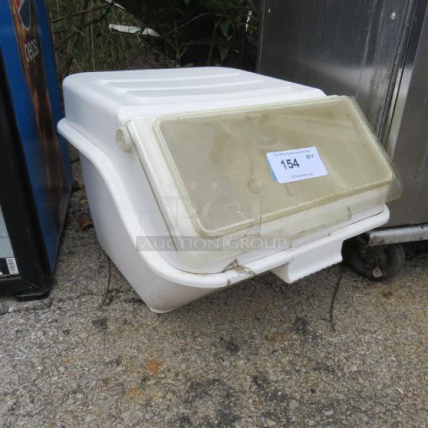 Winco Ingredient Bin in white, slightly worn, hinged lid with label "154". Suitable for storage and kitchen use.