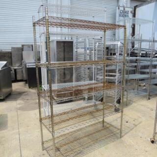 Metro shelf unit with five shelves, 48x18x72 inches. Wire construction, used condition, visible rust on shelves.